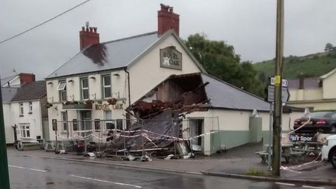 man smashes pub with digger