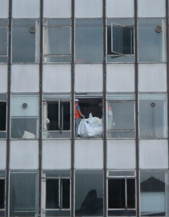 JA BALL Abbey Street builder throw rubish out of window