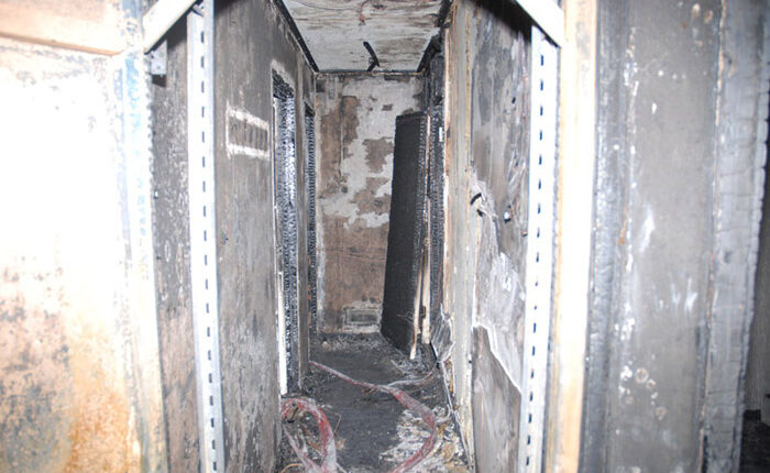 View from the corridor: The above image shows the area leading to the flat where the fire had started (image ©London Fire Brigade)