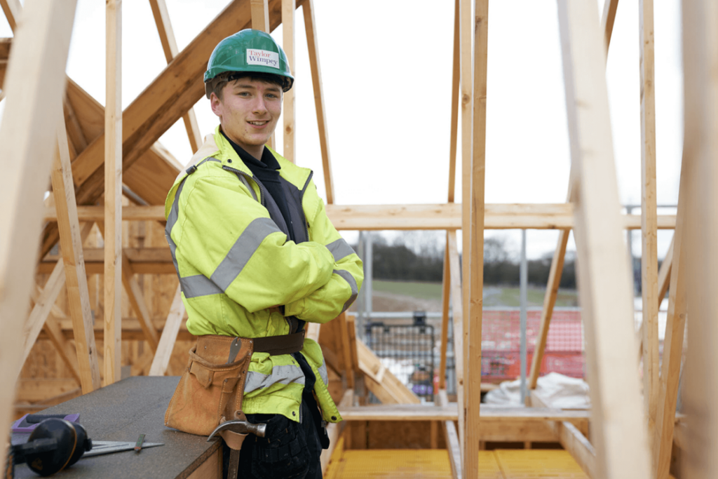Taylor Wimpey reduces management but profits still rise